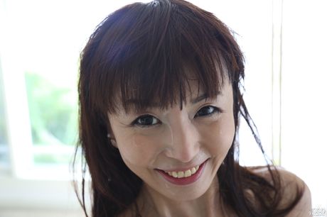 Excellent japanese dark hair Marica Hase work with wet lips on big cock and gets a facial 