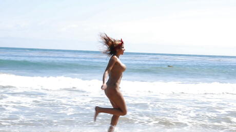 Attractive colombian babe Anita Toro exhibits big titties and spreads her legs at beach