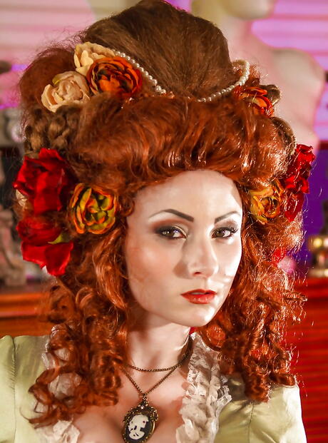 Sexy american red-haired wife Veruca James in cosplay clothing bares her ass and spreads her legs 