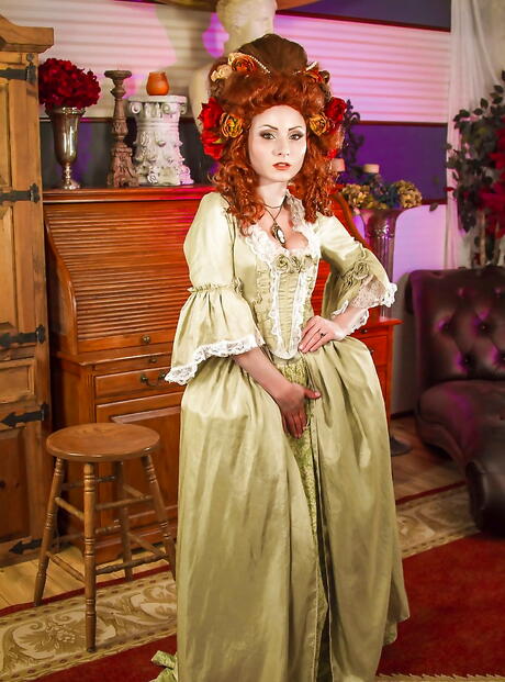 Sexy american red-haired wife Veruca James in cosplay clothing bares her ass and spreads her legs 