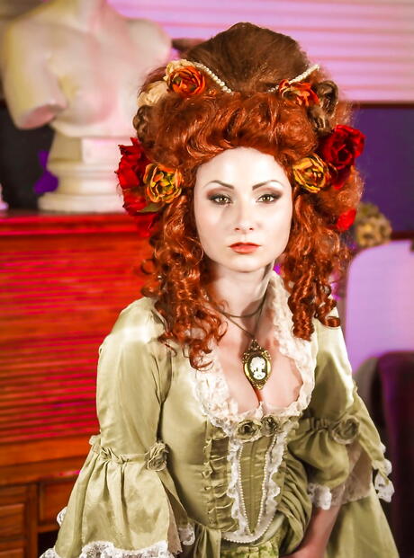 Sexy american red-haired wife Veruca James in cosplay clothing bares her ass and spreads her legs 