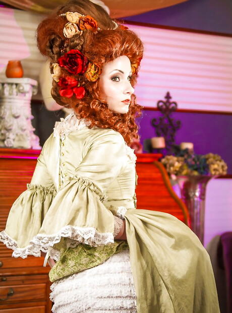 Sexy american red-haired wife Veruca James in cosplay clothing bares her ass and spreads her legs 