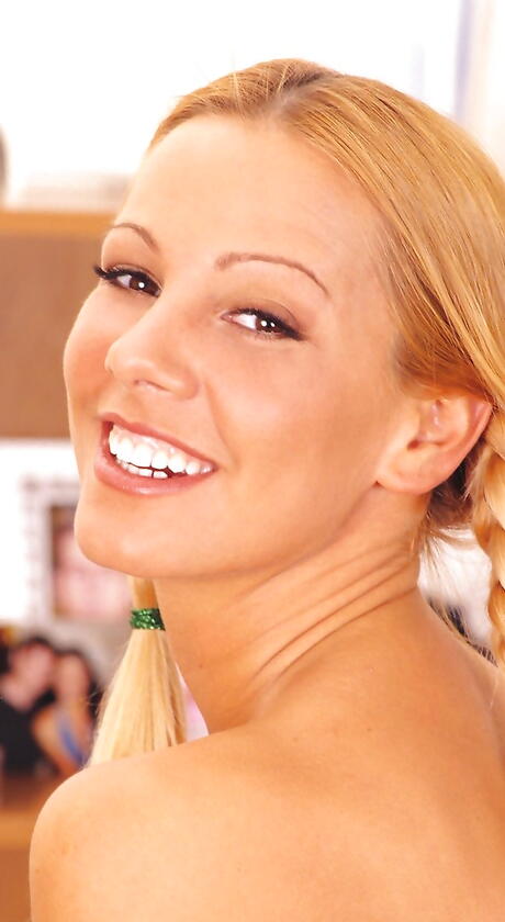 Deluxe blond pornstar Sandy in sexy undies exhibits her ass and hairy pussy 