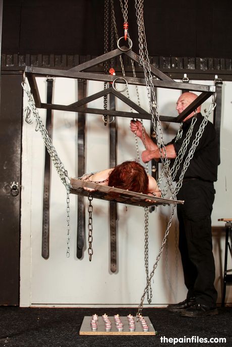 Redhead sub Bemby gets her pussy toyed by a dominant man