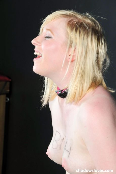 Light-haired Satine Spark gets her feet and toes fucked by a strapon