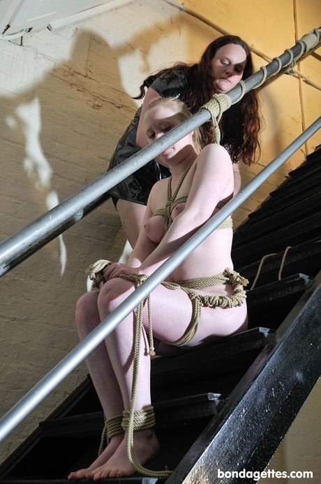 Blonde Satine Spark gets tied up and spanked by her dominant partner