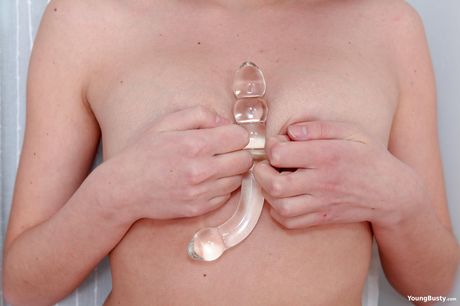 Pretty russian doll Candy Red plays with her massive tits and toys her pussy