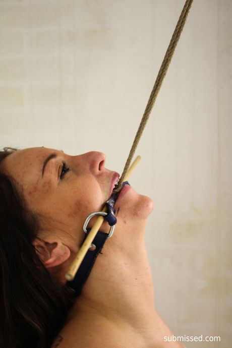 Stunning czech chick DD strips and shows her big boobs while tied up in a chair