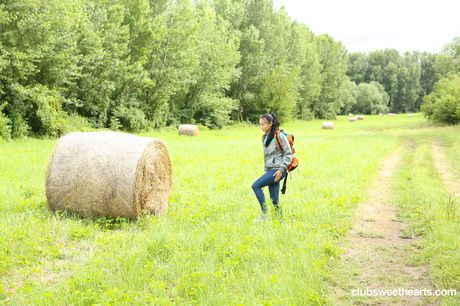 Big tits and pussy of a teen babe Nicole Love are shown outdoors