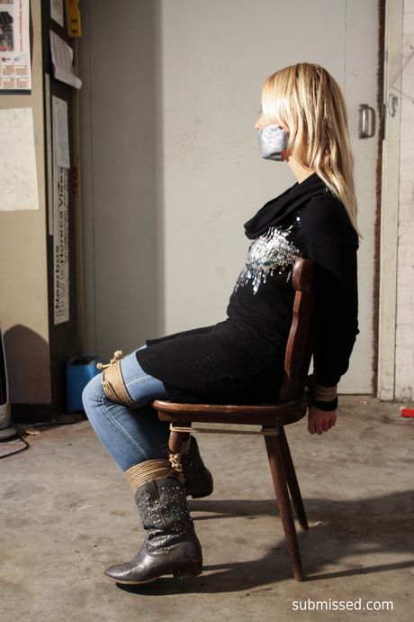 Blonde dutch girl Nathalie gets tied up and spanked in a kinky chair