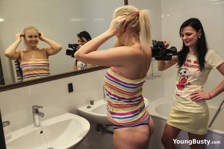 Lovely doll Veronika strips and flaunts her amazing juggs before masturbating