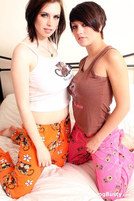 Teen lesbians Louisa Lockhart and Lily Ann remove clothes before pussy play