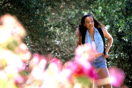 Sexy brunette Strawberry Fields shows her amazing racks and exhibits her perfect body