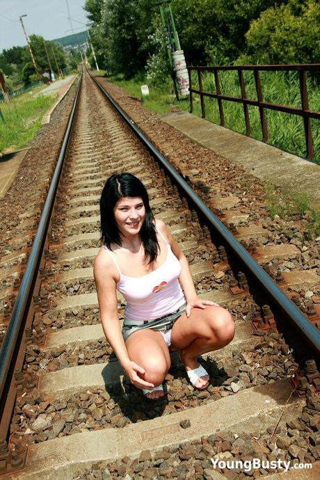 Dark haired teen Allisa B bares her body before toying her pussy