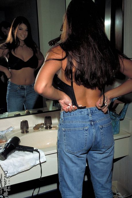 Dark-Haired covergirl Jamie reveals her amazing racks and toys her twat