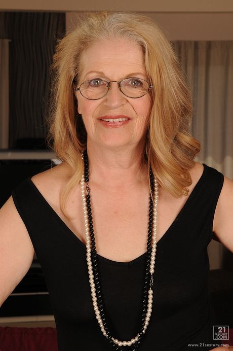 Sultry granny Gabi revealing big boobs and butt 