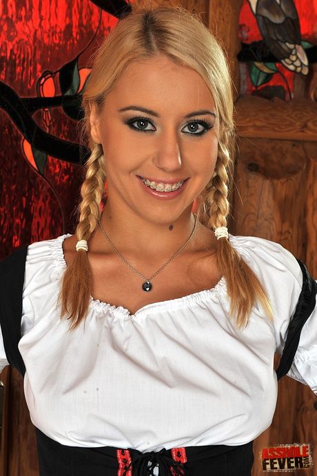 Excellent hungarian babe Nikky Thorne in uniform outfit exhibits big tits and shaved pussy 