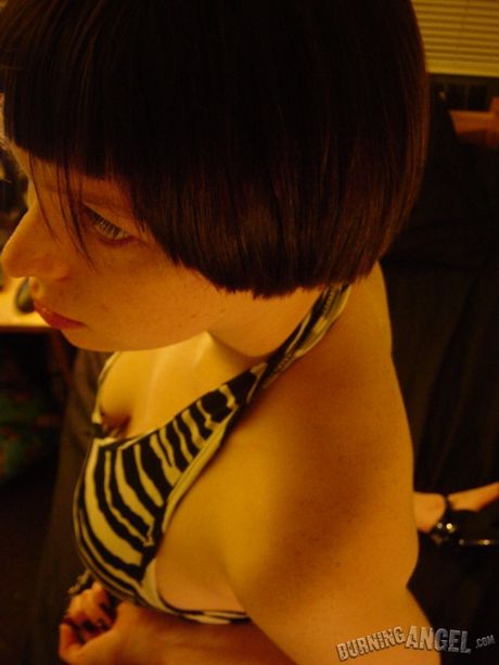 Striking hungarian beauty Liz strips naked and shows her sexy ass and her shaved pussy