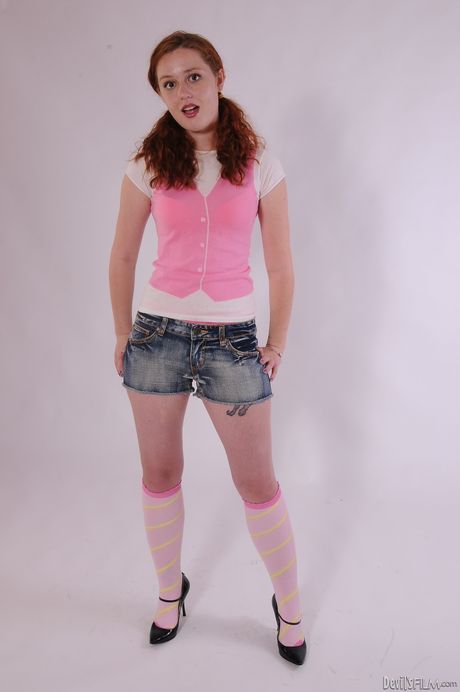 Hot redhead young Meloney Danells in sexy underwear revealing her ass 