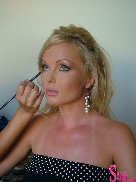 Blonde czech babe Silvia Saint shows off her sexy body and toys her pussy