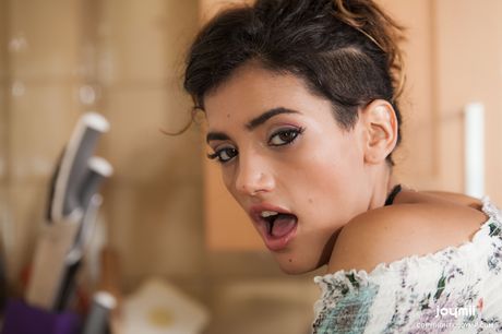 Lascivious spanish cutie Penelope Cum tempts her man in the kitchen for oral sex