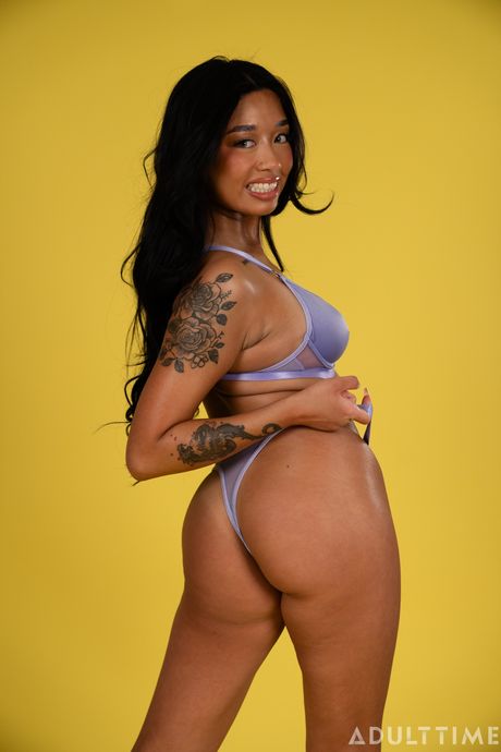 Tattooed Asian chick Gia DiBella has sex with a white man