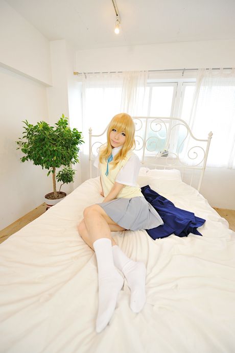 Blonde japanese stunner Haruka gets naked on a bed in white stockings