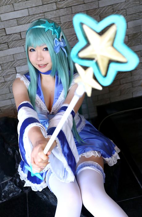 Asian stunner Higurashi Rin models a dress and stockings in a hallway