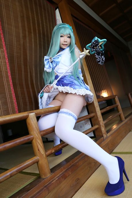 Asian stunner Higurashi Rin models a dress and stockings in a hallway