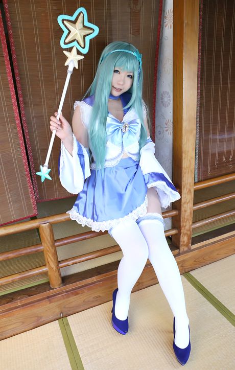 Asian stunner Higurashi Rin models a dress and stockings in a hallway