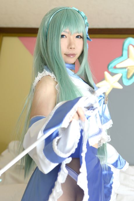 Asian stunner Higurashi Rin models a dress and stockings in a hallway