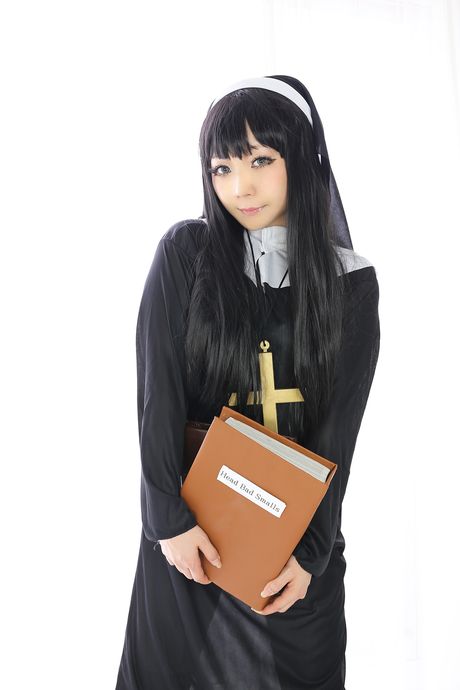 Asian nun Higurashi Rin strips to her stockings and poses in a solo
