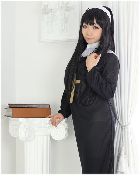 Asian nun Higurashi Rin strips to her stockings and poses in a solo