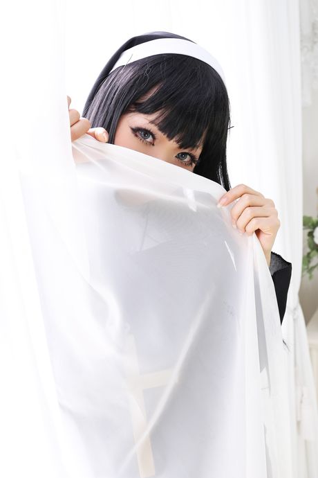 Asian nun Higurashi Rin strips to her stockings and poses in a solo
