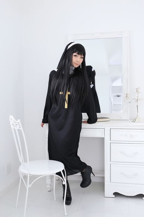 Asian nun Higurashi Rin strips to her stockings and poses in a solo