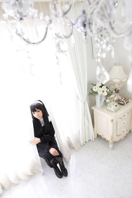 Asian nun Higurashi Rin strips to her stockings and poses in a solo