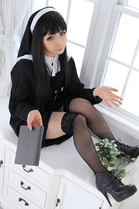 Asian nun Higurashi Rin strips to her stockings and poses in a solo