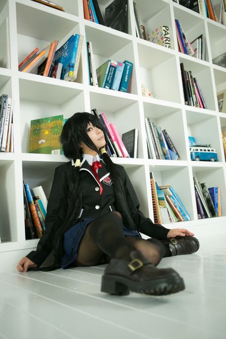 Schoolgirl Rat Sakura strips to her stockings and presents her tits