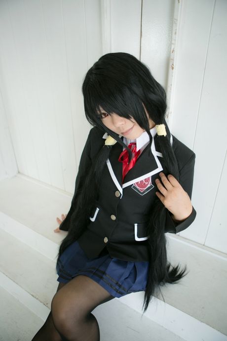 Schoolgirl Rat Sakura strips to her stockings and presents her tits