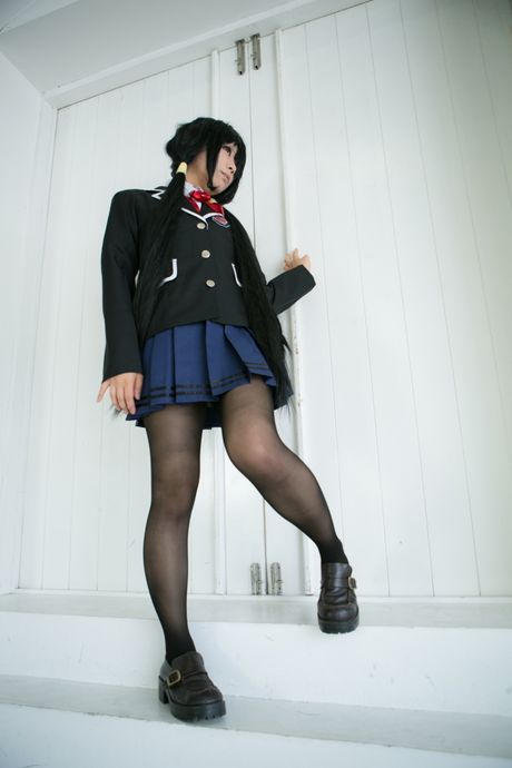 Schoolgirl Rat Sakura strips to her stockings and presents her tits