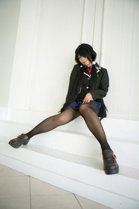 Schoolgirl Rat Sakura strips to her stockings and presents her tits