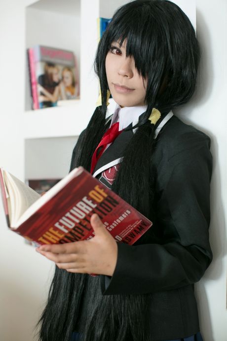 Schoolgirl Rat Sakura strips to her stockings and presents her tits