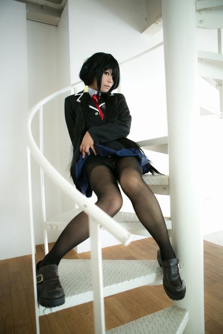 Schoolgirl Rat Sakura strips to her stockings and presents her tits