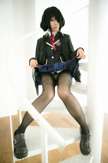 Schoolgirl Rat Sakura strips to her stockings and presents her tits