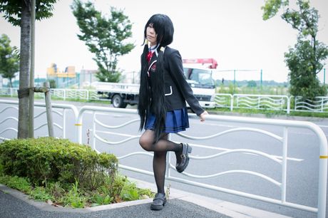 Schoolgirl Rat Sakura strips to her stockings and presents her tits