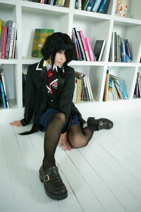 Schoolgirl Rat Sakura strips to her stockings and presents her tits