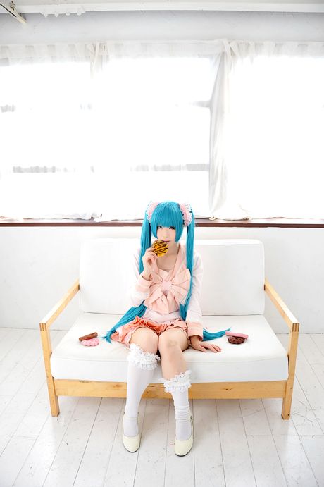 Asian cutie Haruka flaunts her natural small tits and poses in a hot striped outfit