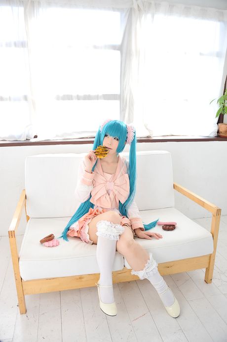 Asian cutie Haruka flaunts her natural small tits and poses in a hot striped outfit