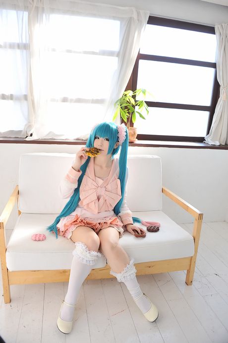 Asian cutie Haruka flaunts her natural small tits and poses in a hot striped outfit