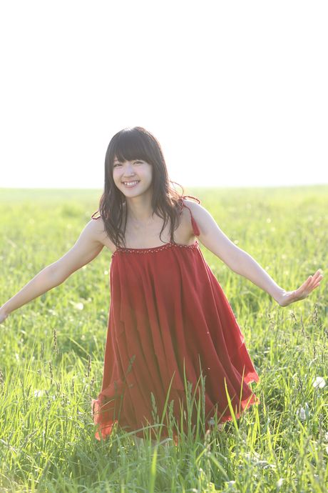 Asian girl Airi Suzuki gets naked on a blanket in a field of wildflowers